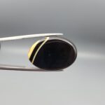Natural Black Banded Sulemani Agate oval cabochon 30.20 carat gemstone from Iran with cream white eye band