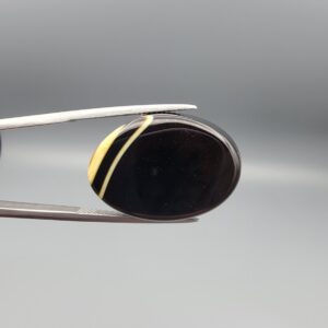 Natural Black Banded Sulemani Agate oval cabochon 30.20 carat gemstone from Iran with cream white eye band
