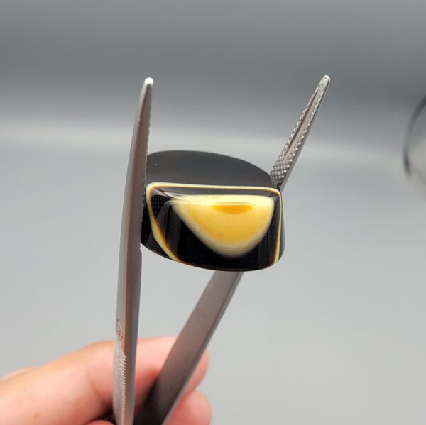 Natural Black Banded Sulemani Agate oval cabochon 30.20 carat gemstone from Iran with cream white eye band