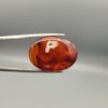 Natural Surkh Aqeeq oval cabochon 27.13 carat translucent red agate with natural white letter P shaped inclusion from Iran
