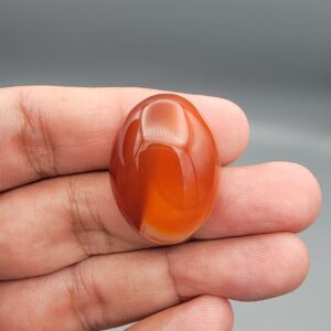 Natural multi-color Sulemani agate oval cabochon 70 carat with red orange and white banded pattern from Iran