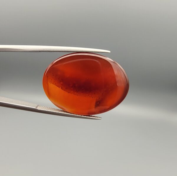 Natural multi-color Sulemani agate oval cabochon 31.80 carat with translucent orange red banding from Iran