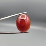 Natural multi-color Sulemani agate oval cabochon 28.53 carat red and black banding with raw natural back from Iran