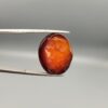 Natural multi-color Sulemani agate oval cabochon 28.53 carat red and black banding with raw natural back from Iran