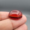 Natural multi-color Sulemani agate oval cabochon 28.53 carat red and black banding with raw natural back from Iran