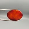 Natural Fire Agate oval cabochon 25.74 carat with yellow orange and red mottled pattern from Iran
