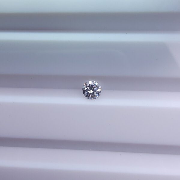 Digital image of a Galaxy Gemological Institute Diamond Report (Certificate # KHI2609950267) dated September 11, 2026, detailing a 0.08 Carat Round Brilliant Cut Natural Diamond with H color and SI1 clarity.