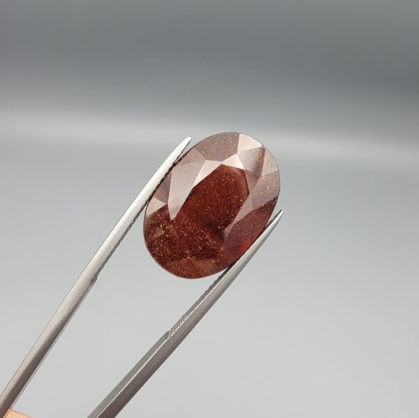 Natural deep red-brown Hessonite Garnet Gomed oval cut gemstone 19.38 carat, untreated January birthstone
