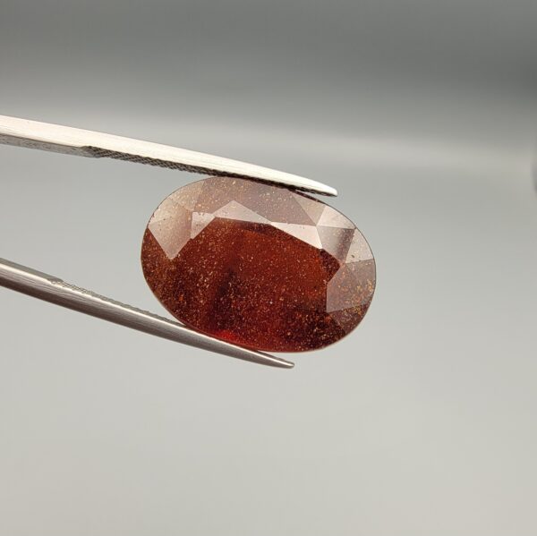 Natural deep red-brown Hessonite Garnet Gomed oval cut gemstone 19.38 carat, untreated January birthstone