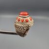 Studio close-up photographs showing the top and side profile views of a handcrafted size 22 solid 925 sterling silver ring featuring a natural Italian coral center stone and matching coral side accents.