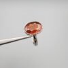 Studio close-up photographs showing the top oval face, 925 stamp, 6.12 weight hallmark, and side profile settings of a natural hessonite gomed sterling silver ring.