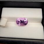"Natural Kunzite gemstone 6.66 carat cushion mixed cut from Afghanistan with GGI gemological certificate showing weight, measurements, and species"