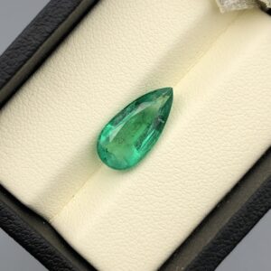 Digital image of a Galaxy Gemological Institute Gemstone Report (Certificate # KHI2609130183) dated September 8, 2026, detailing a 3.69 Carat Pear & Mixed Cut Natural Emerald with transparent green color.