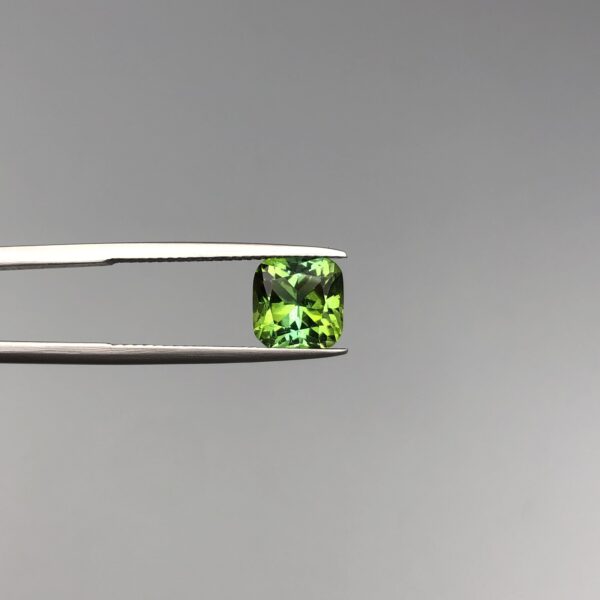 Digital image of a Galaxy Gemological Institute Gemstone Report (Certificate # KHI2609110189) dated September 9, 2026, detailing a 2.86 Carat Cushion & Brilliant Cut Natural Green Tourmaline with transparent clarity.