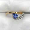 0.69 Carat Natural Ceylon Blue Sapphire & Diamond Bypass Engagement Ring in 18K Yellow Gold – Pear-Cut Neelam Solitaire