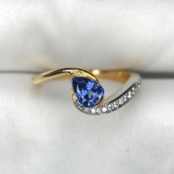 0.69 Carat Natural Ceylon Blue Sapphire & Diamond Bypass Engagement Ring in 18K Yellow Gold – Pear-Cut Neelam Solitaire