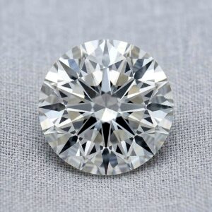 Official GIA Natural Diamond Dossier scan for a 0.61-carat round brilliant loose diamond, detailing report number 1318972900, G color grade, SI2 clarity grade, Excellent cut grade, Excellent polish, Excellent symmetry, None fluorescence, and laser inscription GIA 1318972900.