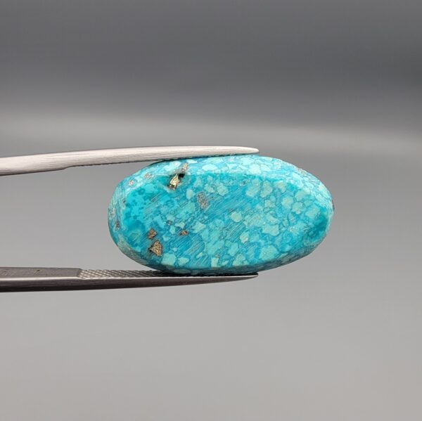 natural turquoise gemstone, persian feroza stone, 19.16 carat turquoise, kerman turquoise iran, Iranian feroza price, metallic pyrite flecks, oval feroza, loose turquoise cabochon, authentic Persian turquoise, premium feroza Pakistan, original kerman feroza Karachi, Iranian turquoise Lahore, Islamic gemstone Pakistan, handmade ring stone Islamabad, luxury gemstone Rawalpindi, authentic feroza stone, gemstone collection Pakistan, feroza price in Pakistan, premium prayer stones Peshawar, Neyshabur style turquoise, natural copper aluminum phosphate, premium Feroza Pakistan, Namak Mandi Peshawar feroza, Urdu Bazaar Lahore stones, Saddar Karachi gemstone shop, Tariq Road feroza dealers, defense Lahore luxury stones, F-7 Islamabad gemstone items, Blue Area Islamabad feroza, Faisalabad gemstone market, Multan stone market, Quetta feroza collection, Hyderabad Sindh gemstones, traditional Islamic stones, collector grade feroza, medium weight turquoise 19ct, oval cut turquoise, natural pyrite webbing stone, master artisan cut, Ramadan gift gemstone, Eid present stone, Islamic holiday gifts Pakistan, spiritual meditation stone, talismanic ring stone, protective talisman Pakistan, gemstone jewelry Pakistan, imported Iranian gemstone, rare pattern feroza, antique finish stone, modern crafted ring stone, luxury men's accessories Pakistan, traditional gift items Pakistan, secure delivery stone Pakistan, online gemstone store Pakistan, verified gemstone dealer, trusted Pakistani shop, wholesale feroza Pakistan, retail gemstone market, custom ring setting, durable turquoise stone, smooth texture cabochon, high density mineral, genuine Iranian import, exclusive gemstone collection, unique pyrite design, beautiful natural matrix, daily wear stone, collector display stone, museum quality gemstone, heritage craft stone, middle eastern style stone, persian artifact, arabian gemstone, traditional Pakistani culture, ethnic gift items, holy month accessories, office desk meditation stone, relaxation gemstone, soothing touch stone, anti-stress stone, mindfulness tool Pakistan, yoga and meditation stones, holistic health accessories, spiritual focus items, premium craft collection, bespoke ring service, master cut gemstone, symmetrical cut, high polish finish, classic Islamic artifact, heritage collection item, rare mineral formation, historical protective stone, classic Iranian quality, premium import items, verified authenticity, top tier craftsmanship, elite collector choice, prestigious gift item, executive accessory Pakistan, corporate gift gemstone, premium packaging items, fast shipping Pakistan, TCS delivery stone, Leopards courier gemstone, cash on delivery feroza Pakistan, customer satisfaction guarantee, trusted online retailer Pakistan, secure payment gateway, best gemstone online shop, top rated stones, exceptional quality assurance, fine jewelry and accessories Pakistan, traditional craftsmanship showcase, artisan support Pakistan, local market favorites, trending gemstone designs, stylish ring stones, elegant masculine accessories, heritage items Pakistan, cultural gift ideas, meaningful present options, anniversary gemstone gift, wedding ring stones, retirement gift stone, graduation present gemstone, milestone celebration items, spiritual milestone gifts, personal devotion accessories, daily wear companion, travel friendly stone, pocket size gemstone, ergonomic cabochon design, comfortable ring mount, vibrant blue pattern, deep metallic pyrite veins, light transmitting matrix, rich visual depth, exquisite natural web, professional stone cutting, uniform sizing, precise weight distribution, premium tactile experience, timeless design aesthetics, enduring quality stone, generational heirloom stone, family treasure gemstone, investment grade gemstone, rare collectible artifacts, organic material, modern spiritual use, cross-cultural appeal, global gemstone standards, local Pakistani appreciation, nationwide delivery service, provincial shipping available, Kashmir gemstone delivery, Gilgit Baltistan crafts, northern areas traditional items, southern Sindh markets, Punjab bustling bazaars, Khyber Pakhtunkhwa heritage crafts, Balochistan traditional items, all Pakistan coverage, reliable logistics network, prompt customer support, professional e-commerce service, dedicated gemstone experts, knowledgeable curators, authentic item description, transparent pricing, competitive market rates, best value gemstone, luxury without compromise, superior material integrity, immaculate condition stone, pristine presentation, ready for gifting, pristine collectible grade