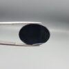 Exceptional 26.53 carat natural black banded agate (Sulemani Aqeeq), expertly finished into a high-gloss oval cabochon displaying a bold, curved concentric white band wrapping seamlessly around an intense jet-black core.