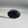 Striking 25.19 carat natural black banded agate (Sulemani Aqeeq) featuring a mirror-polished finish and clean, architecturally precise angular white banding lines contrasting against an intense jet-black body.