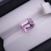 High-resolution digital scan of an official Galaxy Gemological Institute (GGI) Gemstone Report certificate (No. KHI2610220416) dated 14 October 2026 for a 5.68-carat unenhanced transparent pink natural Kunzite (Spodumene) from Afghanistan cut in an emerald step cut.