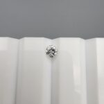 High-resolution digital scan of an official Galaxy Gemological Institute (GGI) Diamond Report certificate (No. KHI260910450427) dated 14 October 2026 for a 0.35-carat natural round brilliant-cut loose diamond displaying H color and SI2 clarity.