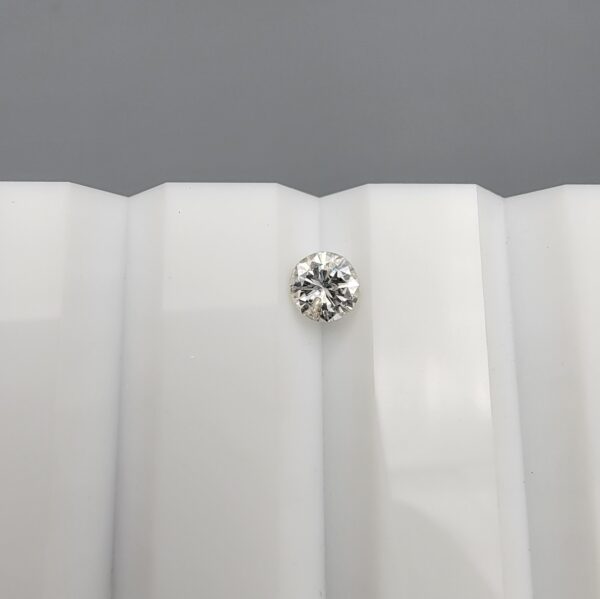 High-resolution digital scan of an official Galaxy Gemological Institute (GGI) Diamond Report certificate (No. KHI2610130428) dated 14 October 2026 for a 0.36-carat natural round brilliant-cut loose diamond displaying H color and I1 clarity.