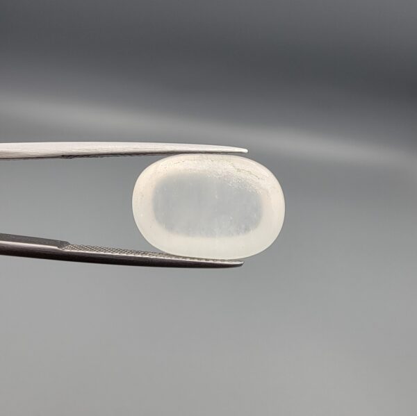 Sacred 15.34 carat authentic untreated Durr-e-Najaf (Clear Rock Crystal Quartz) from Najaf al-Ashraf, Iraq, masterfully polished into a high-luster oval cabochon celebrating spiritual purity and peaceful energy.