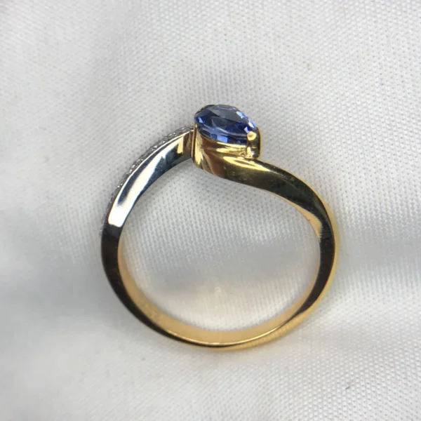 0.69 Carat Natural Ceylon Blue Sapphire & Diamond Bypass Engagement Ring in 18K Yellow Gold – Pear-Cut Neelam Solitaire