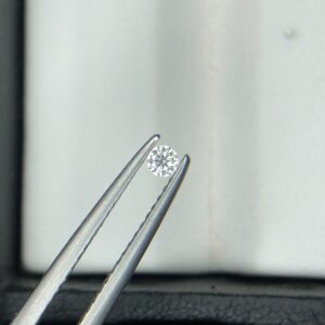 Official Diamond Report card scan from NY. Gemological Institute for a 0.05-carat round brilliant loose natural diamond, detailing report number NYDGR64-7863203 (dated Oct 26 2026), H color, VVS2 clarity, Very Good cut, Very Good polish/symmetry, None fluorescence, and measurements 2.35-2.36x1.50 mm.