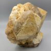 High-resolution macro photographs showcasing a monumental 2,318-gram natural Smoky Quartz multi-crystal cluster specimen from Pakistan, featuring fully formed translucent smoke-tea quartz prisms with sharp pyramidal terminations, natural earthy mineral coatings, and white feldspar matrix accents.