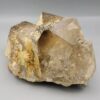 High-resolution macro photographs showcasing a monumental 2,318-gram natural Smoky Quartz multi-crystal cluster specimen from Pakistan, featuring fully formed translucent smoke-tea quartz prisms with sharp pyramidal terminations, natural earthy mineral coatings, and white feldspar matrix accents.