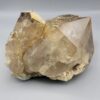 High-resolution macro photographs showcasing a monumental 2,318-gram natural Smoky Quartz multi-crystal cluster specimen from Pakistan, featuring fully formed translucent smoke-tea quartz prisms with sharp pyramidal terminations, natural earthy mineral coatings, and white feldspar matrix accents.