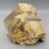 High-resolution macro photographs showcasing a monumental 2,318-gram natural Smoky Quartz multi-crystal cluster specimen from Pakistan, featuring fully formed translucent smoke-tea quartz prisms with sharp pyramidal terminations, natural earthy mineral coatings, and white feldspar matrix accents.