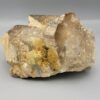 Acquire a raw geological masterpiece with this 2,318 Gram Natural Multi-Crystal Smoky Quartz Cluster on Feldspar Matrix. Mined directly from the world-renowned alpine-type mineral pegmatites of Pakistan, this 100% natural, untreated cabinet specimen showcases a dramatic assembly of robust, smoky-tea colored quartz crystals anchored onto a creamy white feldspar host rock. The specimen features sharp, undamaged pyramidal terminations, distinct hexagonal crystal faces, and natural earthy mineral dusting that attests to its unrefined, straight-from-the-earth authenticity. Revered globally by mineral collectors and metaphysical practitioners alike as the premier stone of grounding (Zameen) and electromagnetic clearing, Smoky Quartz neutralizes negative energy, grounds spiritual intentions, and instills mental clarity and resilience. Weighing over 2.3 kilograms, this museum-quality mineral cluster serves as an imposing centerpiece for luxury interior decor, executive study displays, corporate lobbies, or high-end mineral collections.