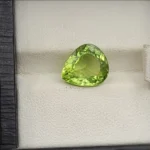 Vibrant 3.67 Carat Natural Kohistan Peridot (Zabarjad) pear cut gemstone featuring brilliant facet geometry and vivid olive-green saturation.