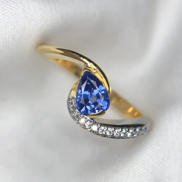 0.69 Carat Natural Ceylon Blue Sapphire & Diamond Bypass Engagement Ring in 18K Yellow Gold – Pear-Cut Neelam Solitaire